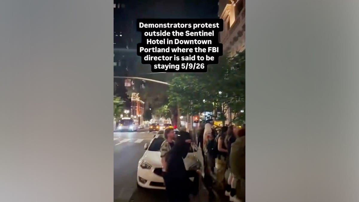 Crowd of protesters shouting outside the Sentinel Hotel in Portland, Oregon