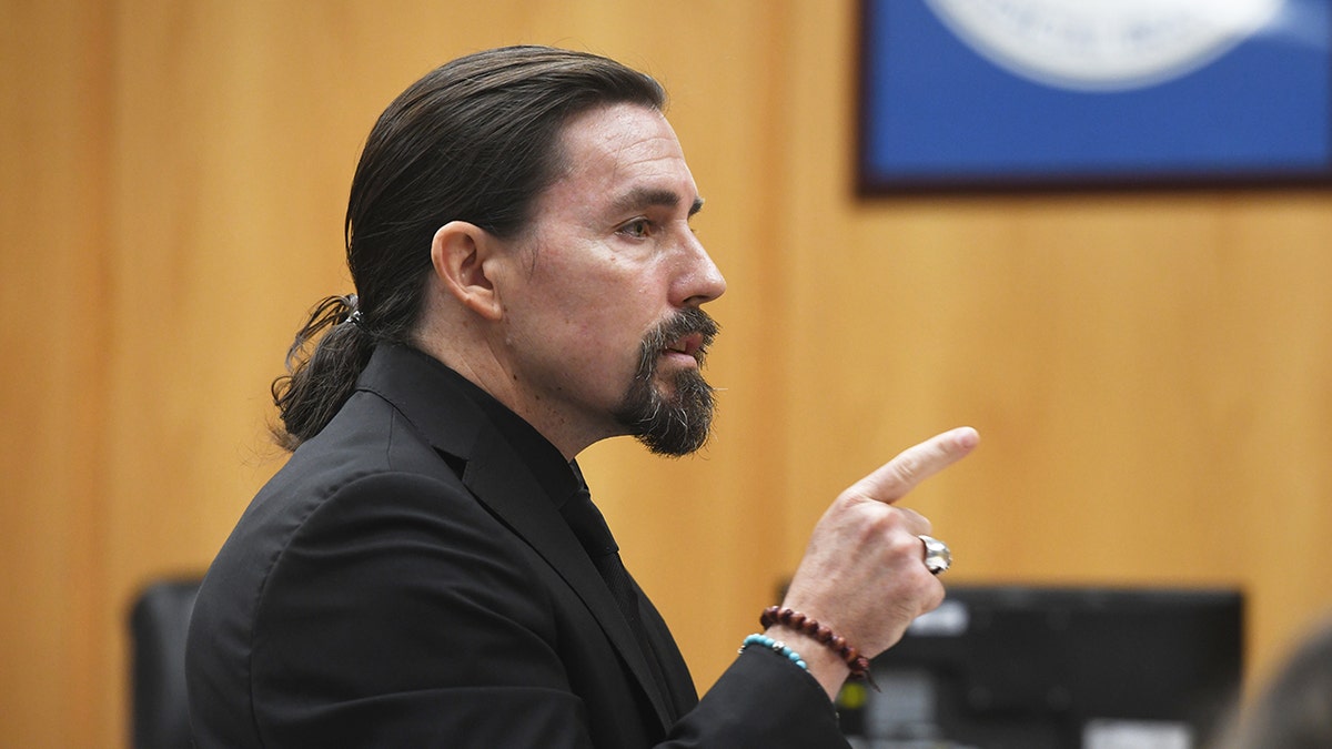Defense attorney Kevin Smith speaking to the jury in a courtroom in Milford, Connecticut