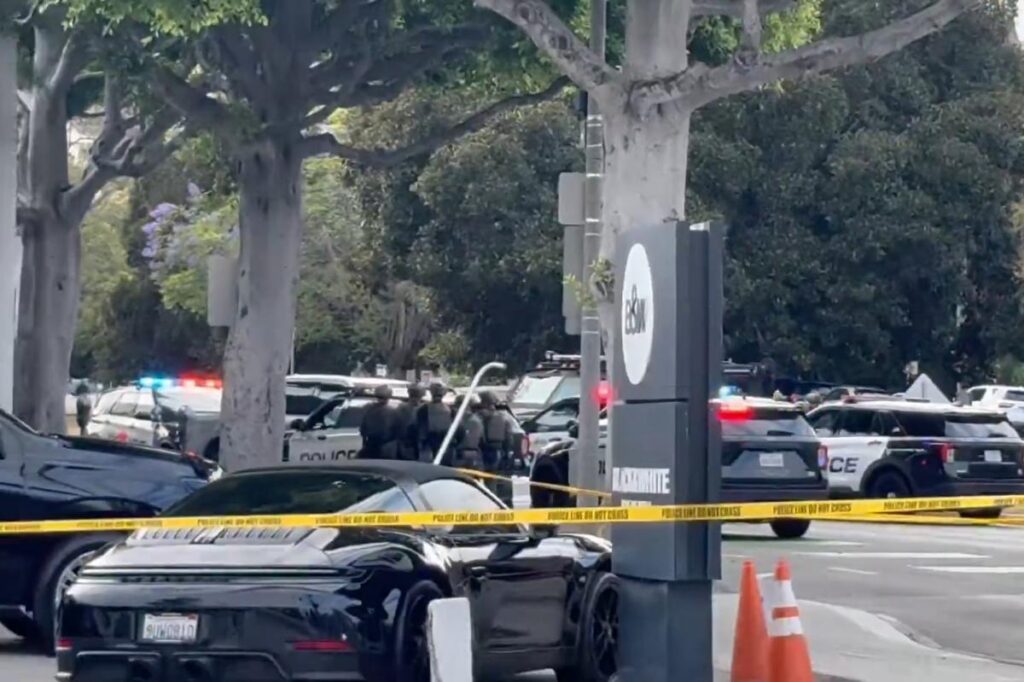 Armed suspect barricades himself in truck with female hostage in Beverly Hills after trying to mow down sheriff’s deputy