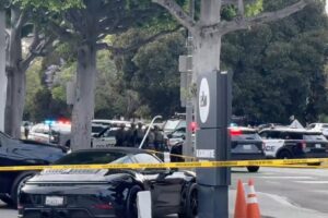 Armed suspect barricades himself in truck with female hostage in Beverly Hills after trying to mow down sheriff’s deputy