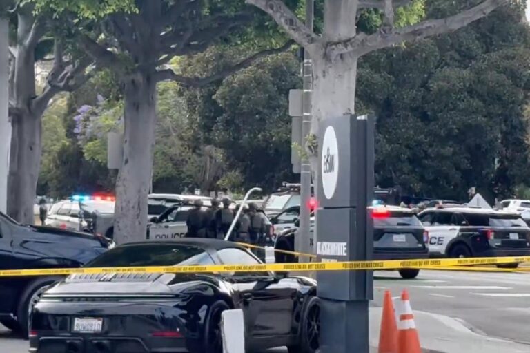 Armed suspect barricades himself in truck with female hostage in Beverly Hills after trying to mow down sheriff’s deputy