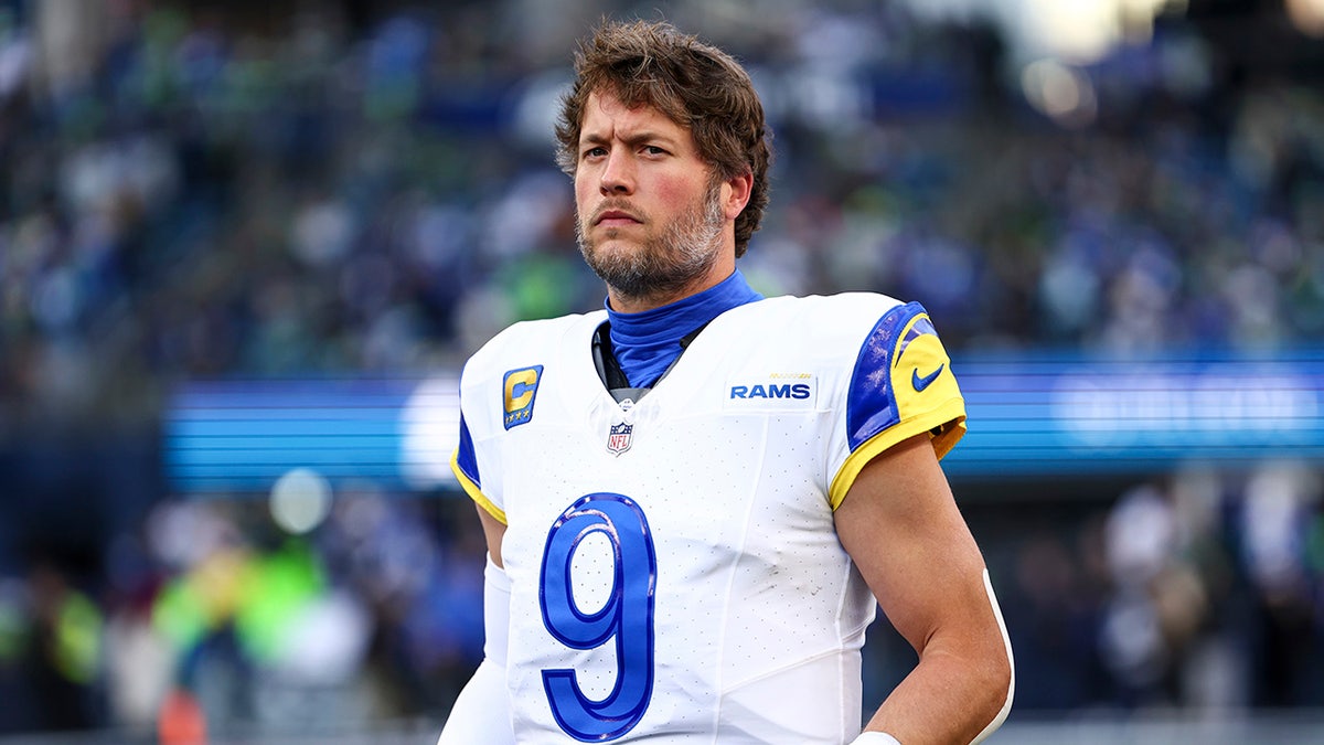 Matthew Stafford standing on the field at Lumen Field in Seattle