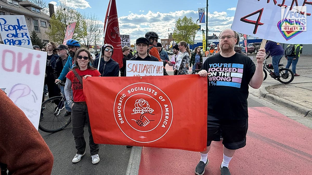 Democratic Socialists of America sign held by protesters at Minneapolis rally