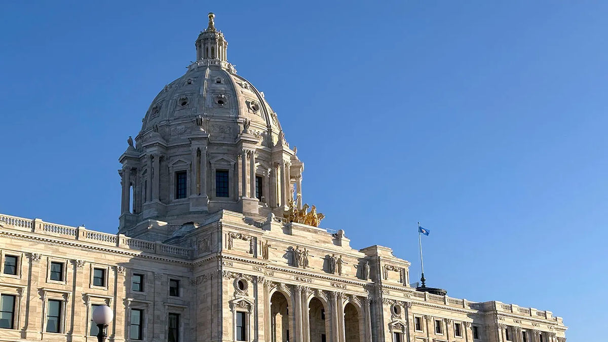 Minnesota State Capitol building illuminated by sunlight in St. Paul.