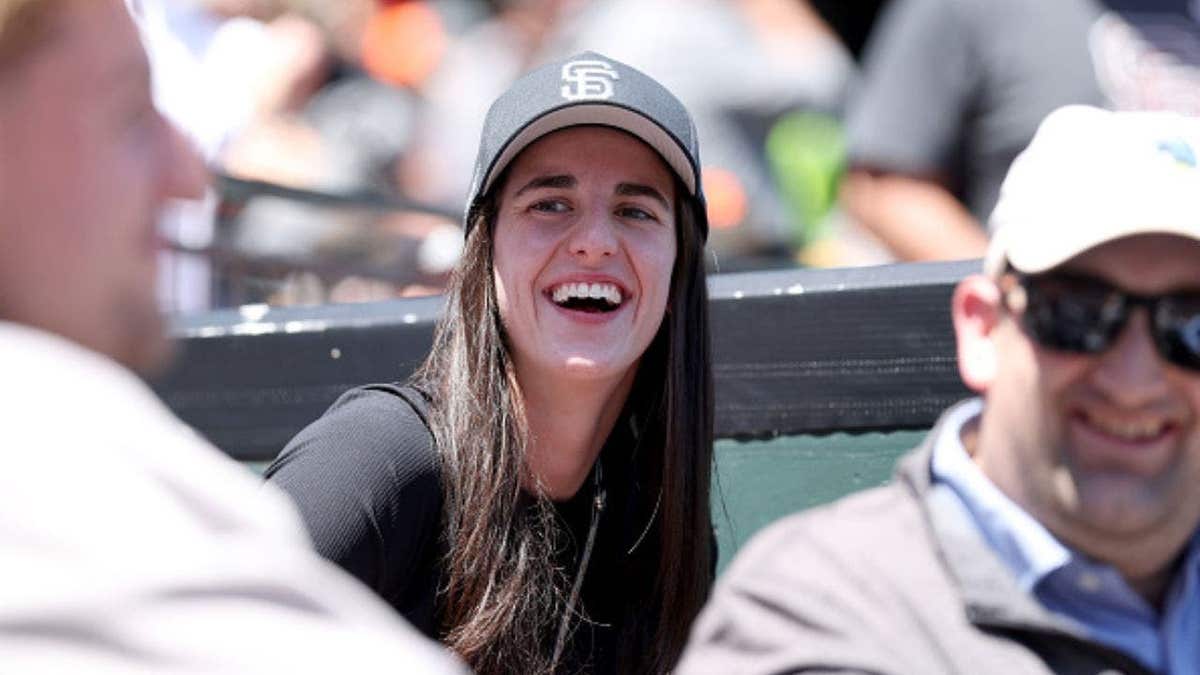 Caitlin Clark looks on during MLB game at Oracle Park
