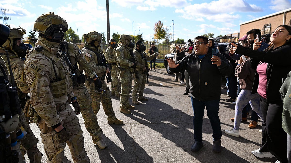 Residents and protesters clashing with U.S. Border Patrol and federal agents in Chicago neighborhood