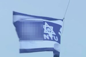 Swastika flag raised above NYU building named after billionaire Jewish causes donor during graduation week