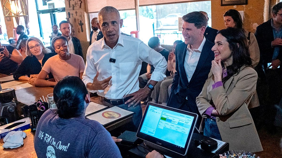 Former President Barack Obama, James Talarico, and Gina Hinojosa meet patrons at Taco Joint restaurant.