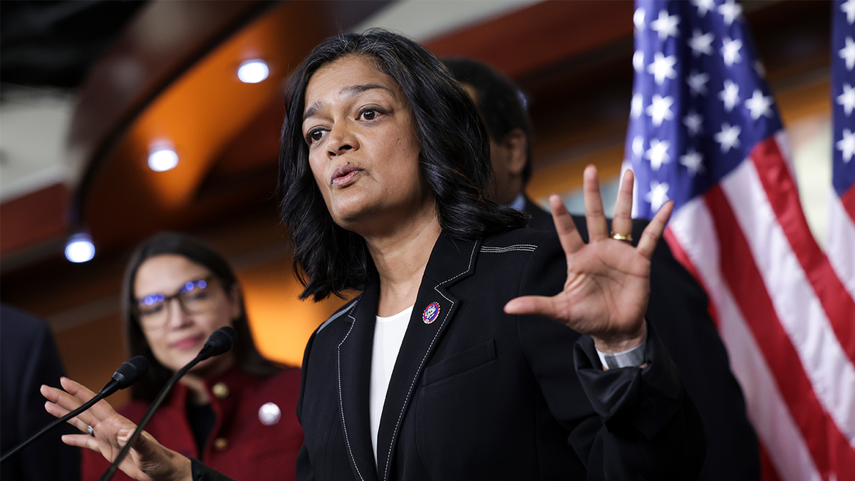Rep. Pramila Jayapal speaking at a news conference on Capitol Hill with Rep. Alexandria Ocasio-Cortez