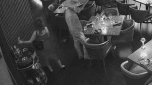 SEE IT: Couple allegedly caught on video swiping K bottle from table in brazen restaurant theft