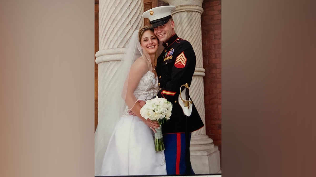Ryan Mehaffey in uniform with wife on wedding day