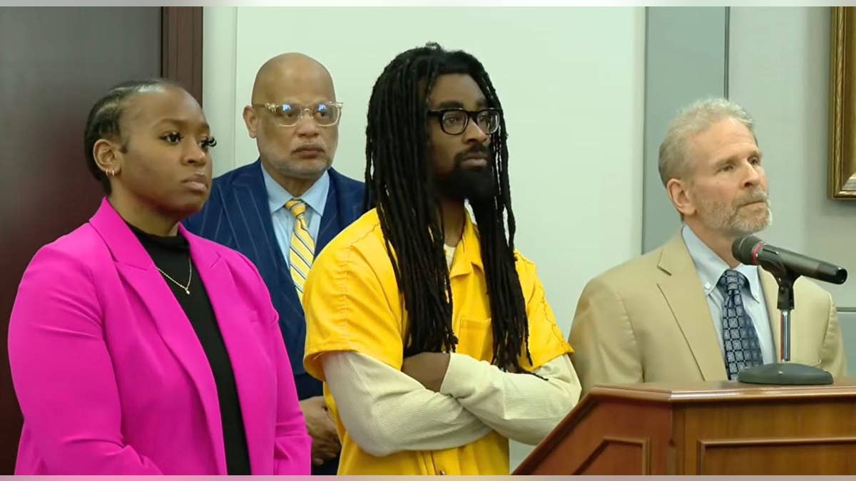shaquille taylor yellow prison jumpsuite