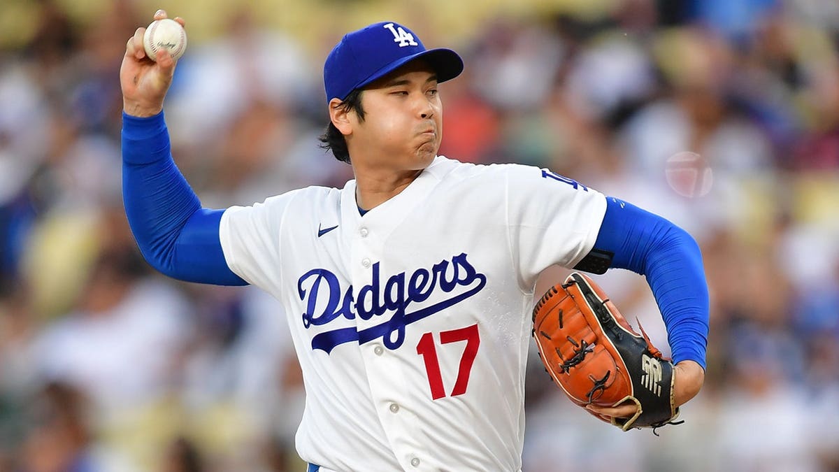 Shohei Ohtani pitching during a baseball game at Dodger Stadium