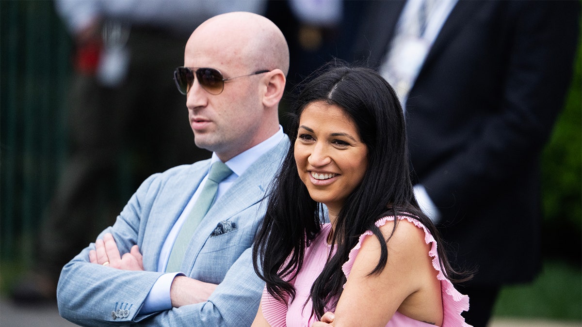 Stephen Miller and his wife Katie Miller standing at the White House Easter Egg Roll event