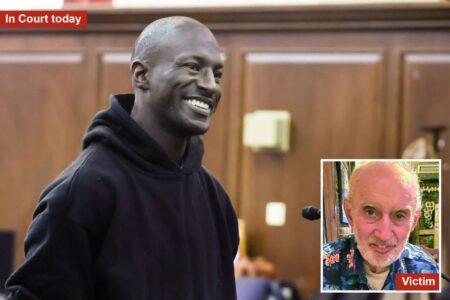 Subway shove suspect flashes smile in court after allegedly killing retired NYC teacher