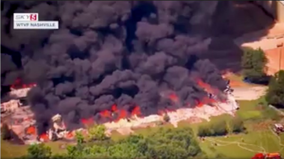 Flames and black smoke could be seen coming from the large building.