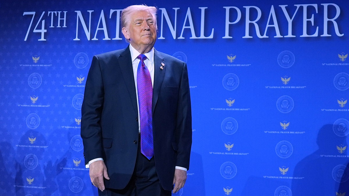 President Donald Trump arriving to speak at the National Prayer Breakfast in Washington