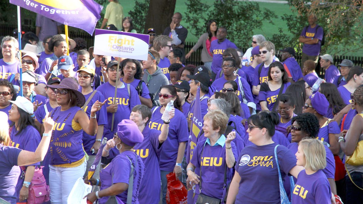 Unionized workers marching in the 2012 Toronto Labor Day Parade