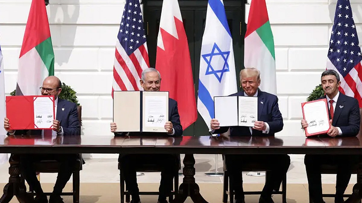 Israeli Prime Minister Benjamin Netanyahu and foreign ministers Abdullatif bin Rashid Al Zayani and Abdullah bin Zayed Al Nahyan join President Trump on the White House South Lawn