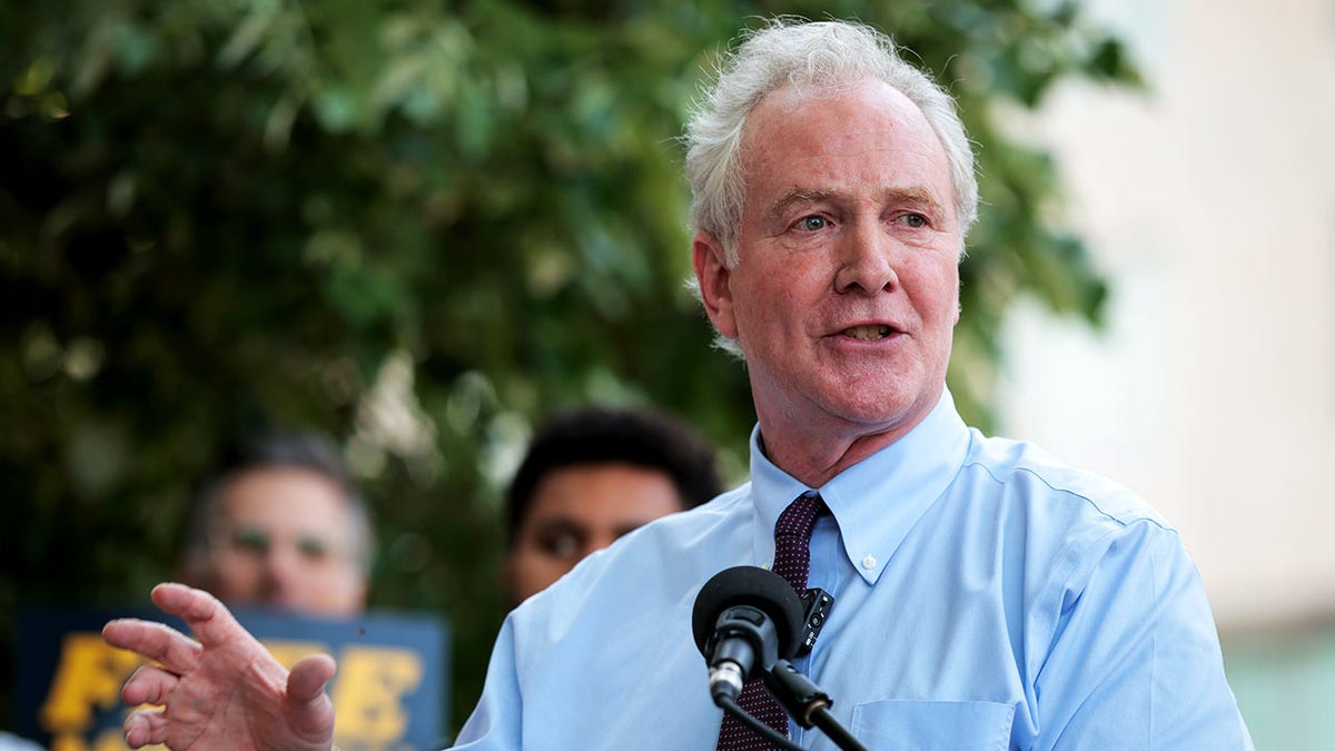 Sen. Chris Van Hollen speaking at a rally in Washington, D.C.