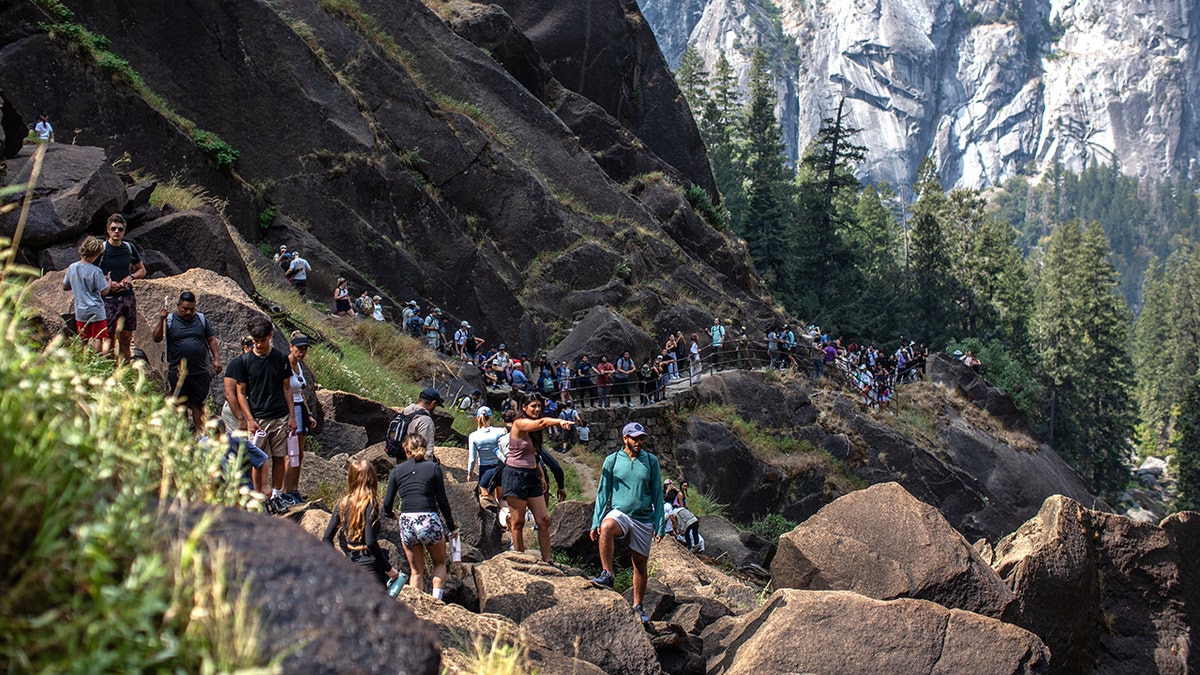 Visitors hiking the Mist Trail toward Vernal Falls in Yosemite National Park