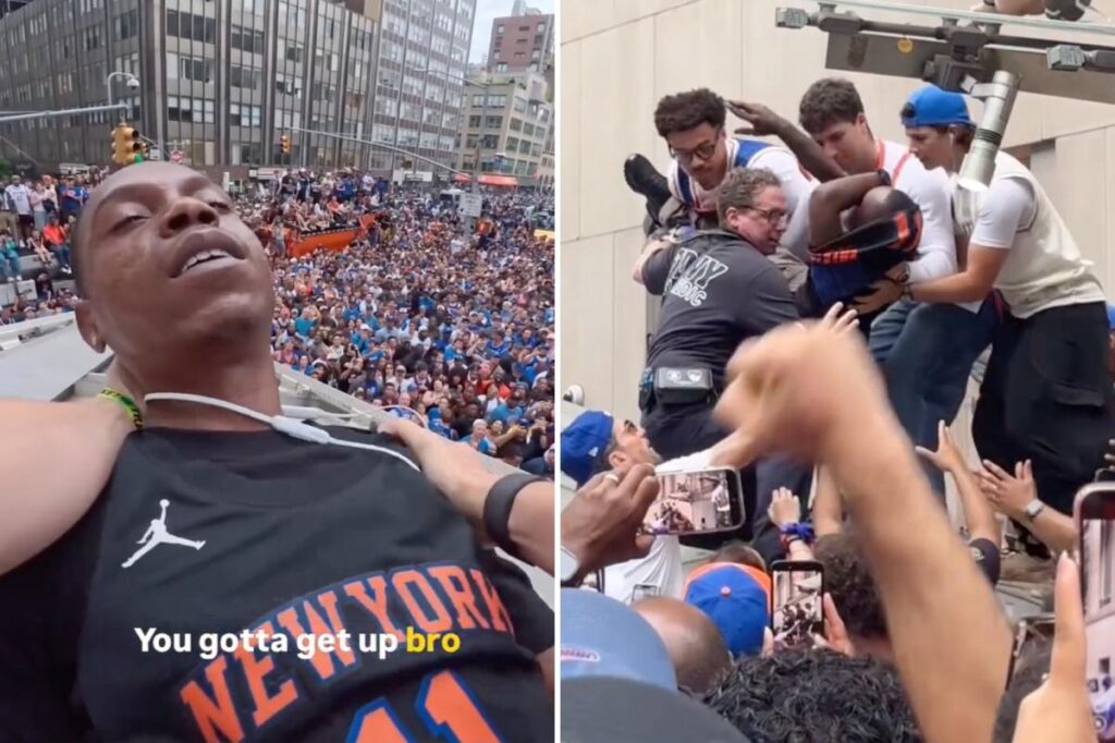 Chaotic moment Knicks fans climb structure to save reveler from apparent overdose during championship parade Chaotic moment Knicks fans climb structure to save reveler from apparent overdose during championship parade