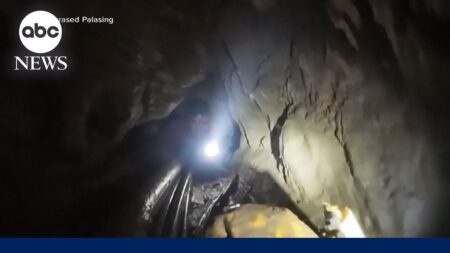 Rescuers say they heard knocking as time runs out to save 2 remaining in flooded cave