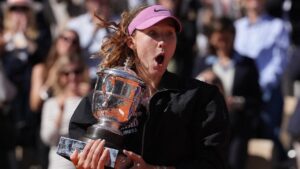 French Open winner Mirra Andreeva quickly corrects trophy pose after historic victory