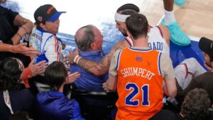 Knicks guard nearly wipes out Michael Bloomberg diving for loose ball during NBA Finals Game 3