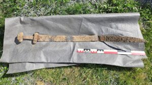 Ancient Viking sword discovered ‘sticking up out of the ground’ after 1,300 years