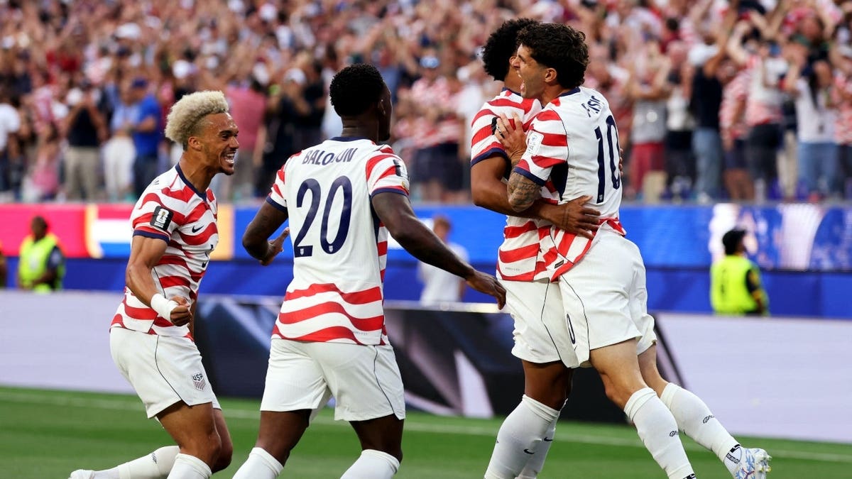 Team USA celebrates a goal vs. Paraguay in a 2026 FIFA World Cup Group D match at SoFi Stadium in Los Angeles.