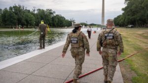Former Olympian among those charged with vandalizing Reflecting Pool, Trump vows immediate repairs: report