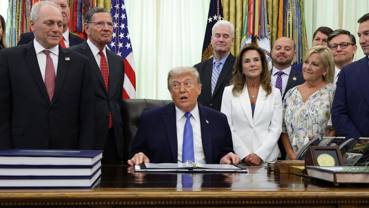 Trump-signing-the-Secure-America-Act