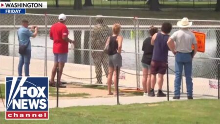 ‘DISTURBING’: Reflecting Pool sealed off with fences after alleged razor attack