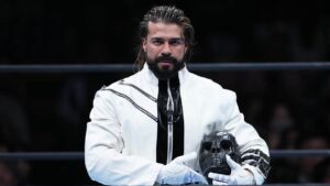 AEW star Andrade El Idolo takes out MJF at Forbidden Door to help Mark Briscoe win cage match, earn title shot