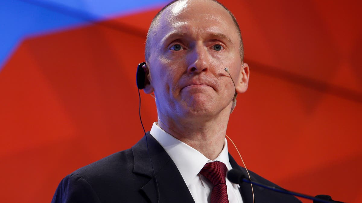 Carter Page speaking to an audience during a presentation in Moscow