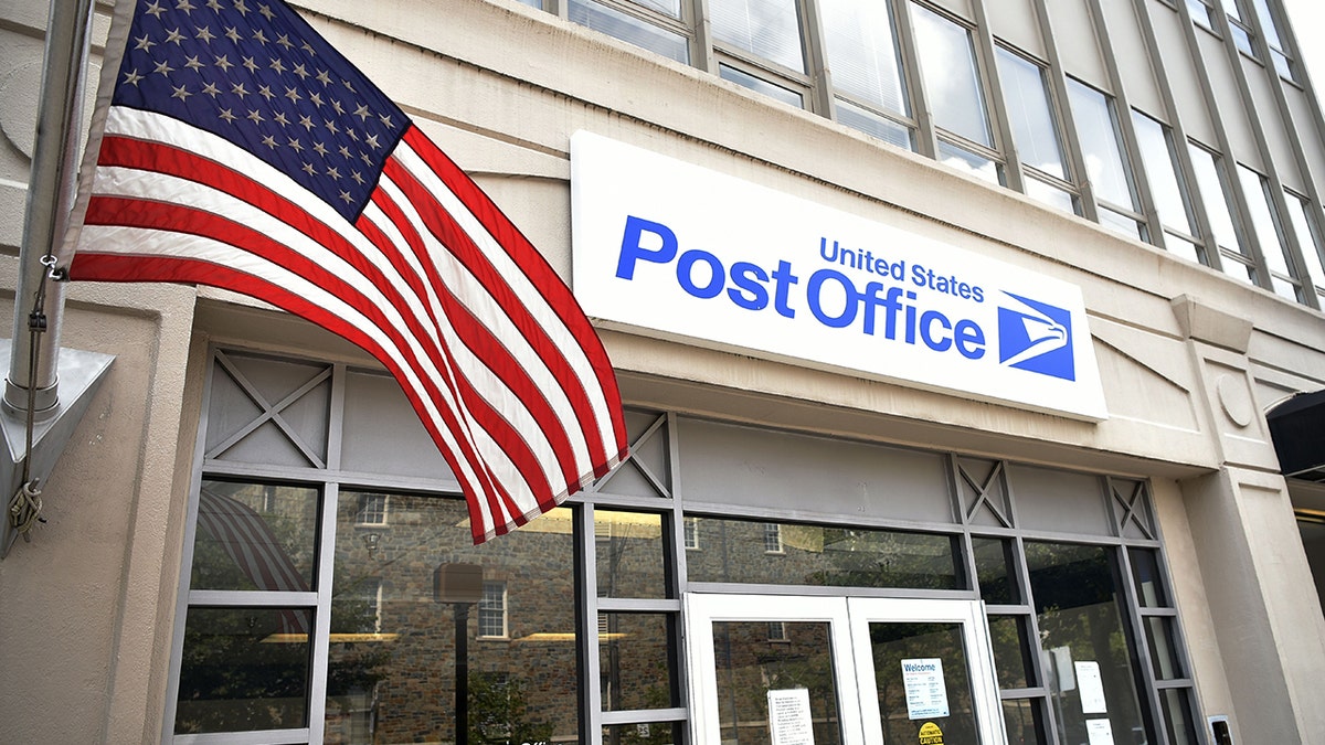 US Postmaster General Louis DeJoy standing outside a US Post Office in Bethesda Maryland
