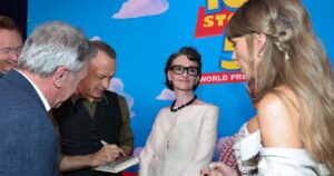 Taylor Swift Had Tom Hanks Sign a ‘Toy Story’ VHS in Sweet Moment at ‘Toy Story 5’ Premiere