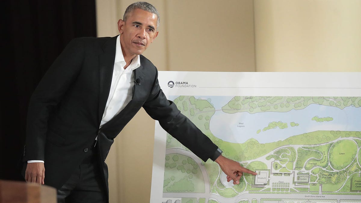 Former President Barack Obama pointing during a gathering at South Shore Cultural Center in Chicago
