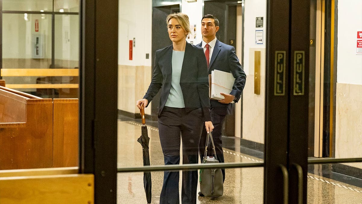Matthew Nilo and fiancé Laura Griffin arriving at court