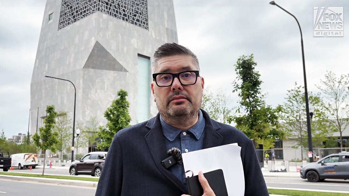 Mike Owen standing outside the Obama Presidential Center.