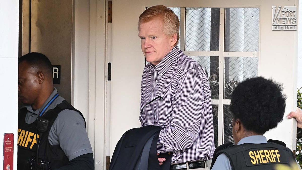 Alex Murdaugh is led into Colleton County courthouse in Walterboro South Carolina surrounded by police
