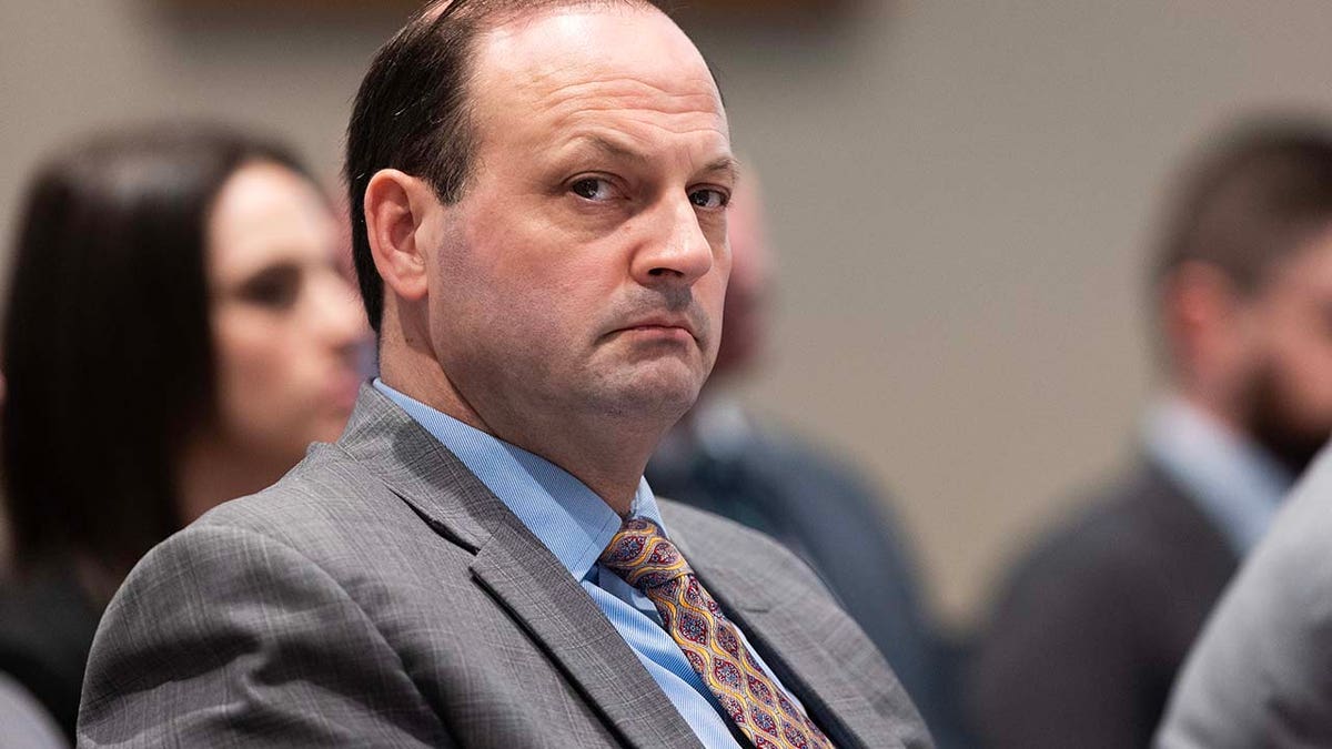 South Carolina Attorney General Alan Wilson looks over to Alex Murdaugh during trial closing arguments