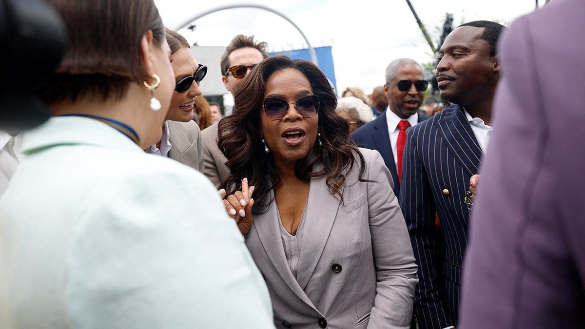 Oprah Winfrey attends former President Barack Obama's Presidential Center opening