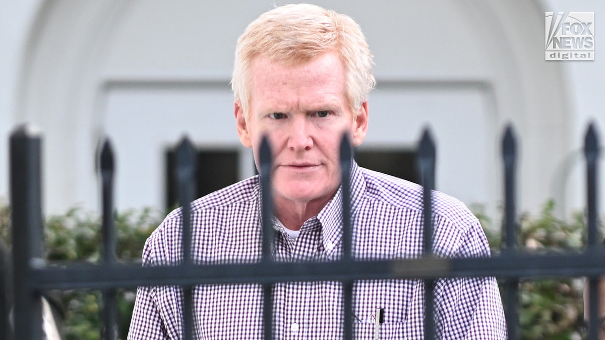 Alex Murdaugh is escorted outside the Colleton County Courthouse in South Carolina.