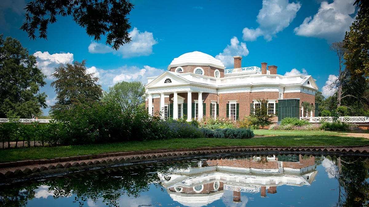 Reflection of Thomas Jefferson's Monticello on pond water in Charlottesville, Virginia.
