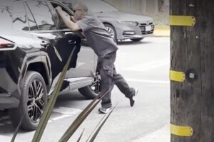 Angry man seen dangling off the side of car in San Francisco road rage incident: ‘He’s running him over’