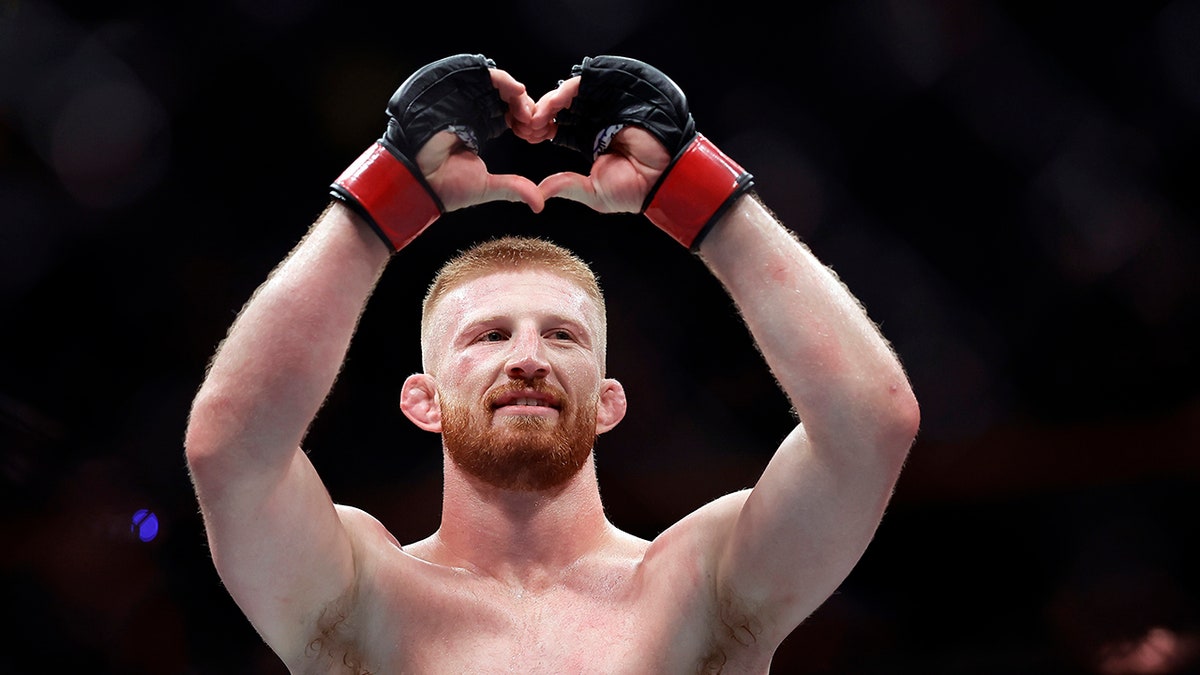 Bo Nickal reacting after defeating Paul Craig in a UFC 309 middleweight bout