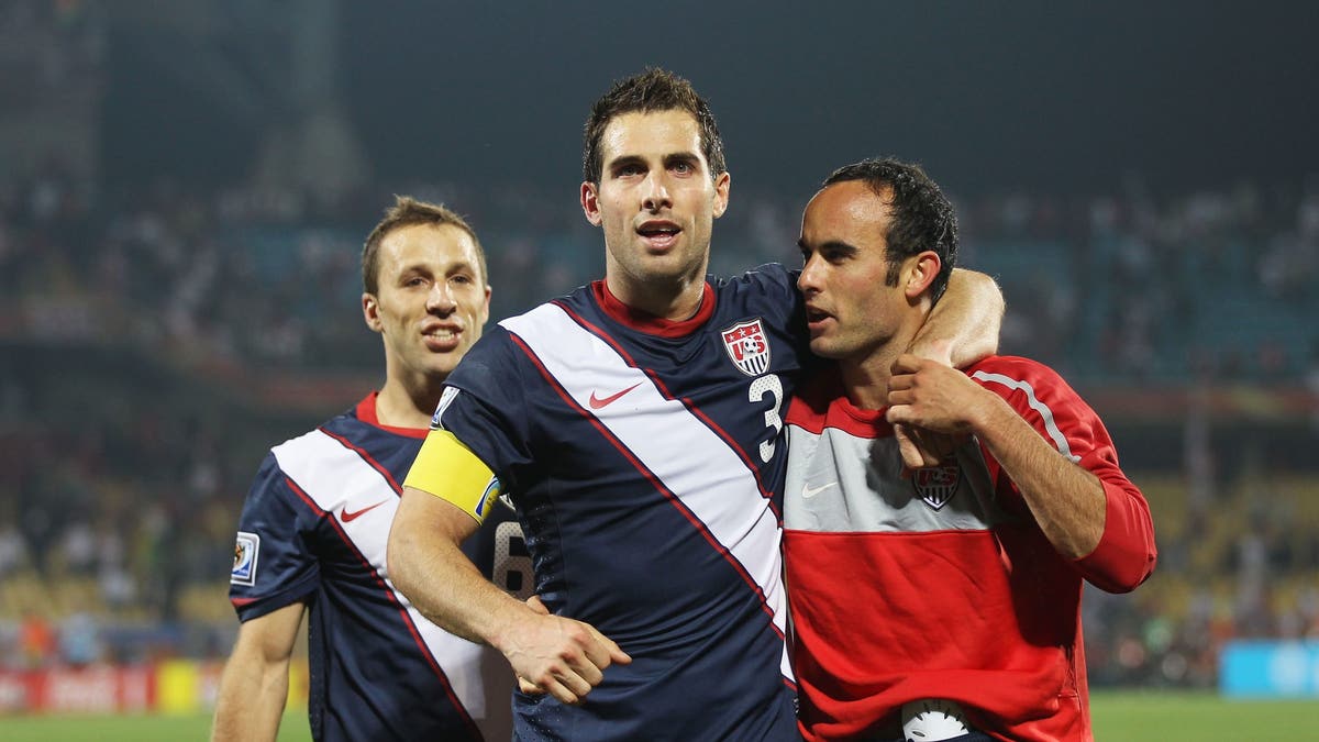 Carlos Bocanegra alongside Landon Donovan. (Photo by Phil Cole/Getty Images)