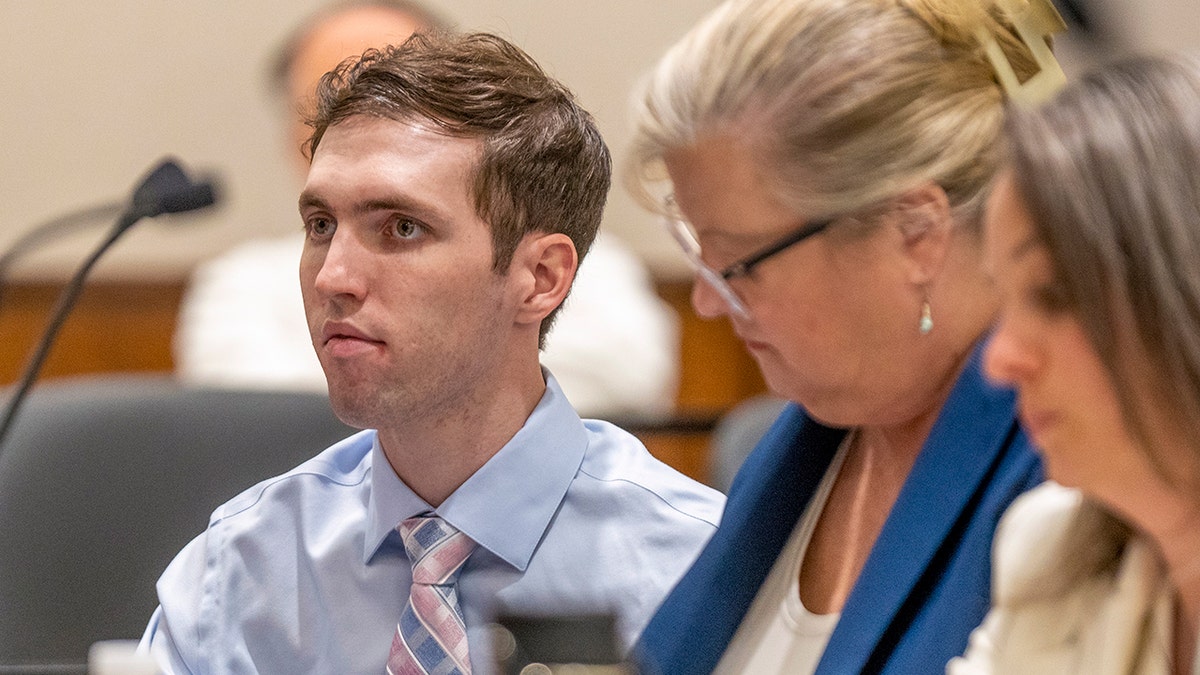Tyler Robinson standing in a courtroom in Provo, Utah.